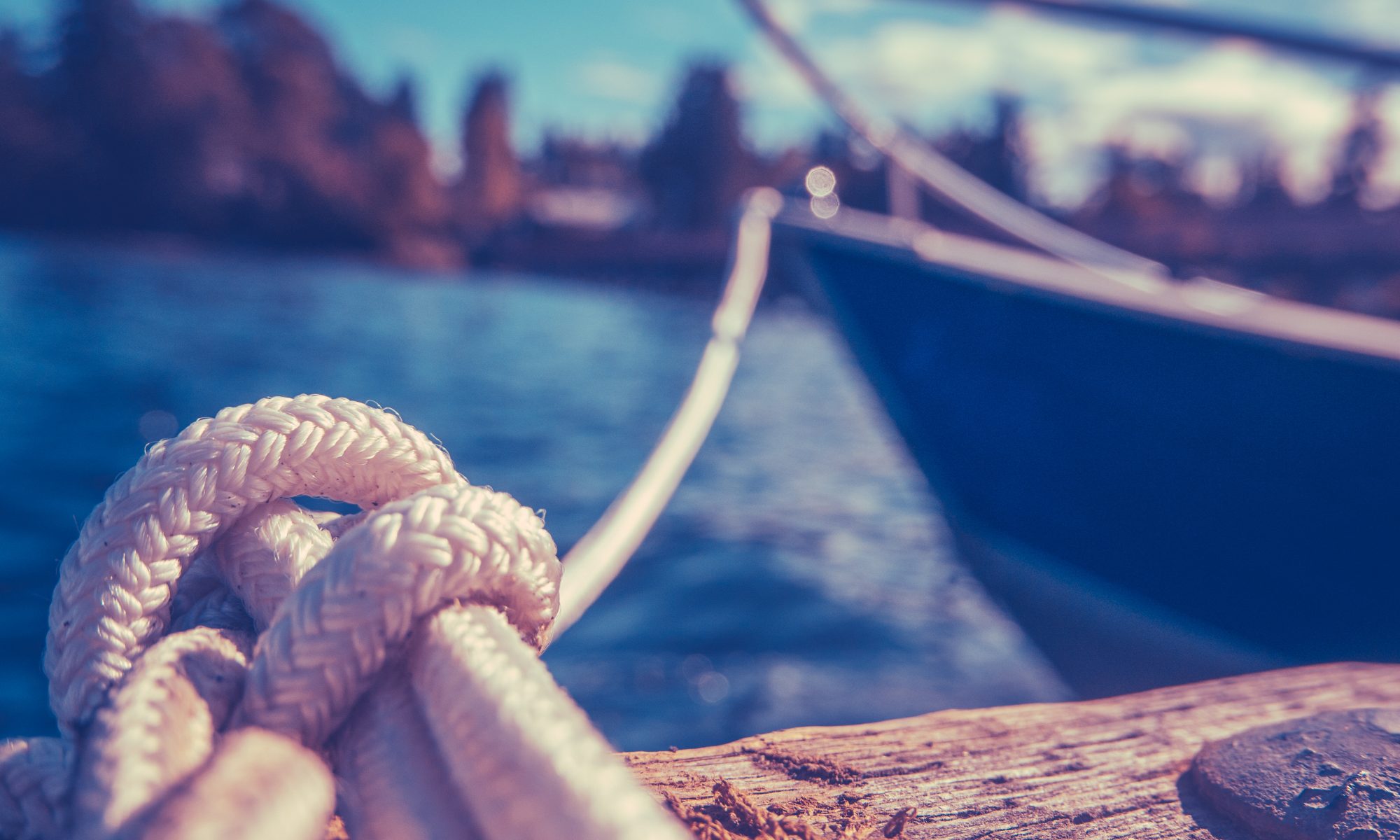 Retro Filtered Photo Of A Luxury Yacht Tied To Pier