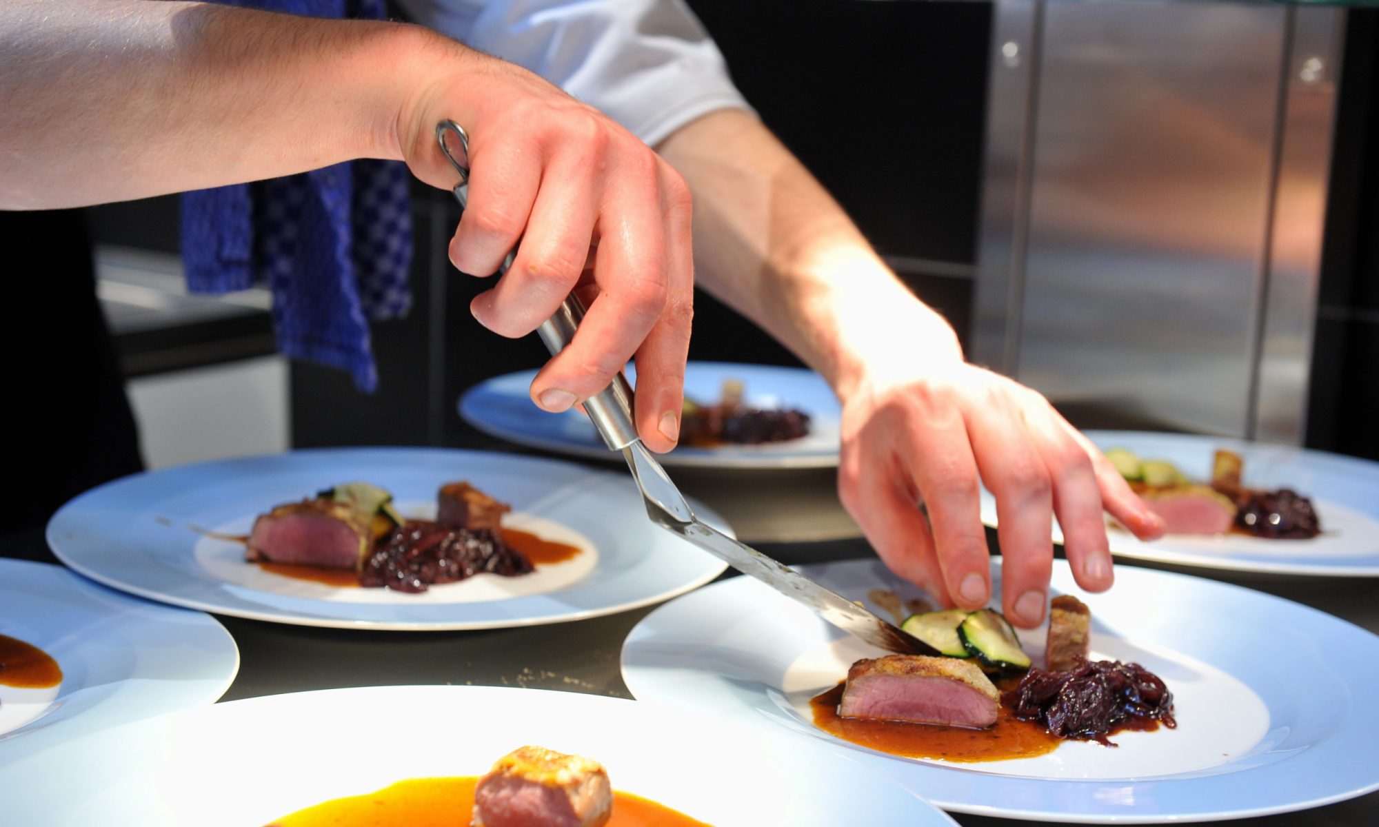 Food on white plates - Food Expo Hong Kong