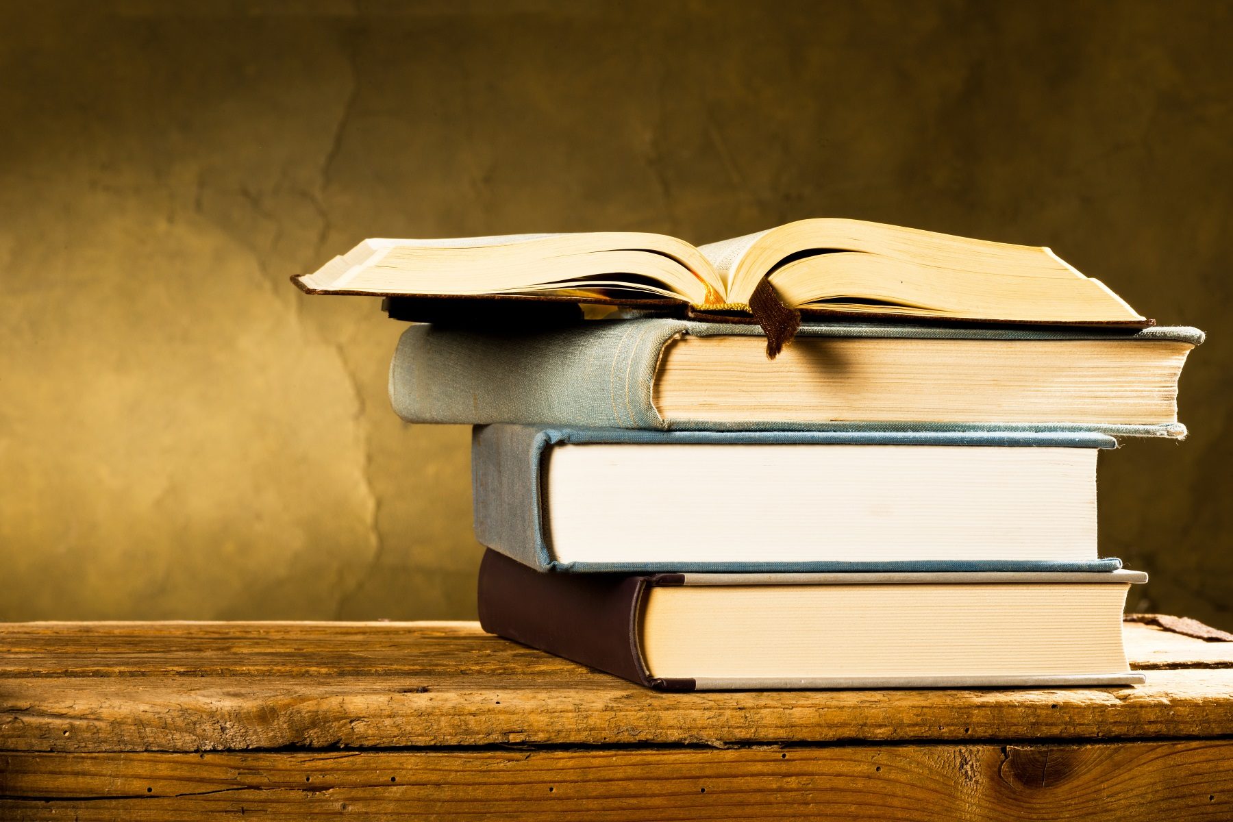 Books at a wooden table - IFOA International Festival of Authors