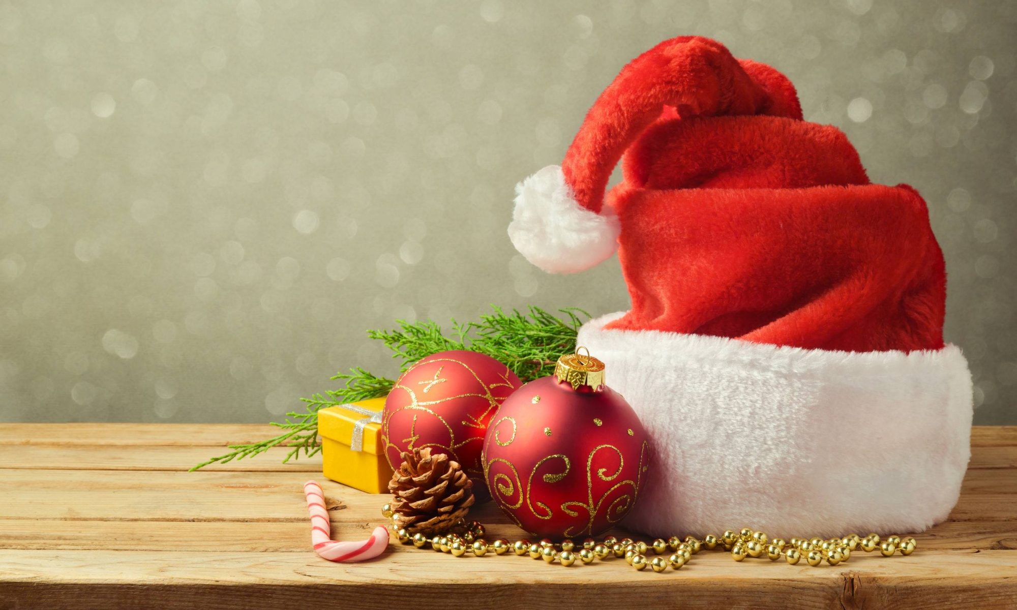 Santa Claus Cap on a wood table - Santa Claus Parade